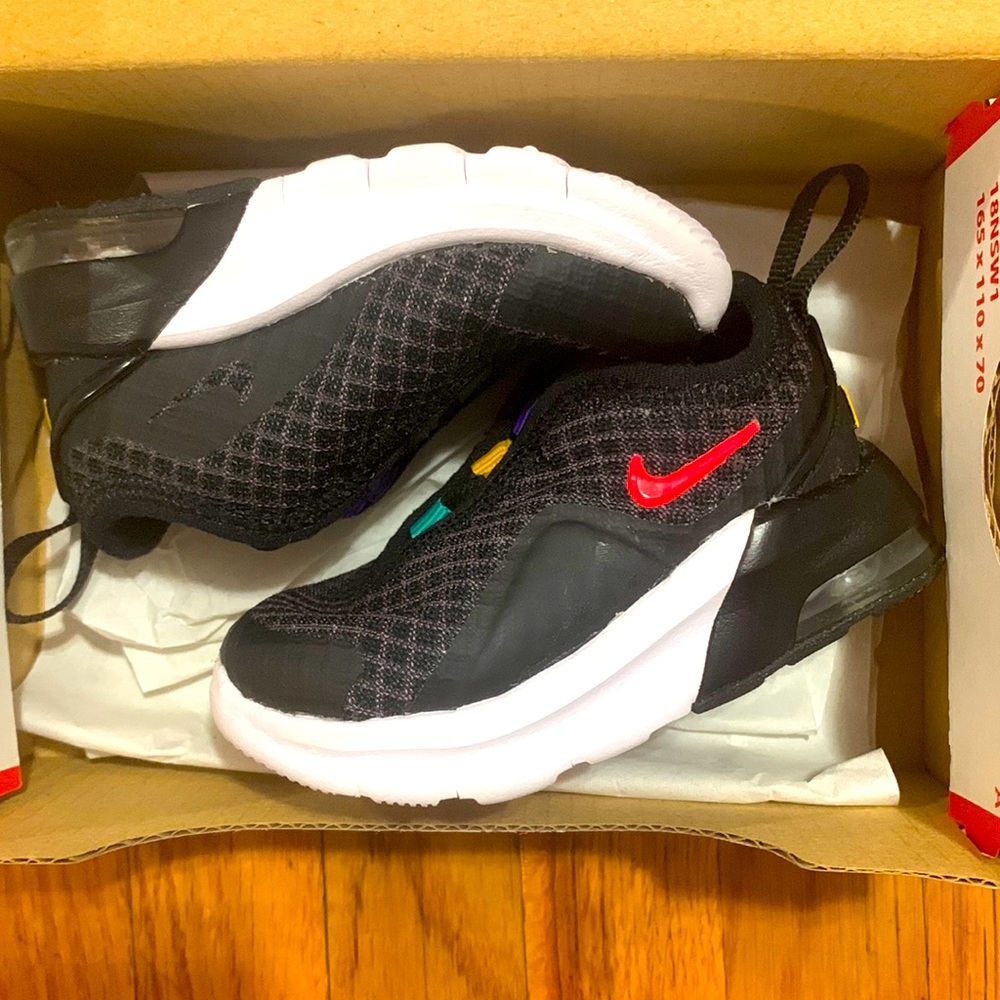 Black infant Nike sneakers